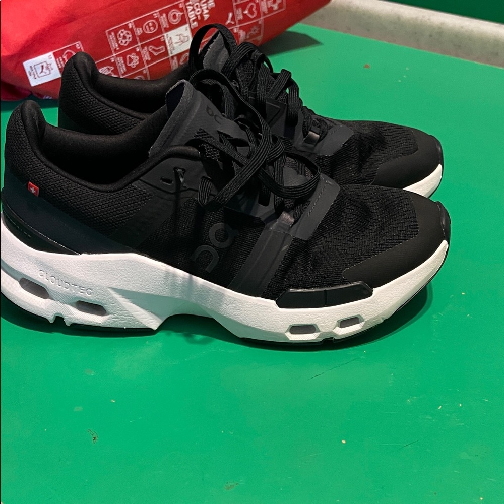 On Running Black and White Athletic Shoes